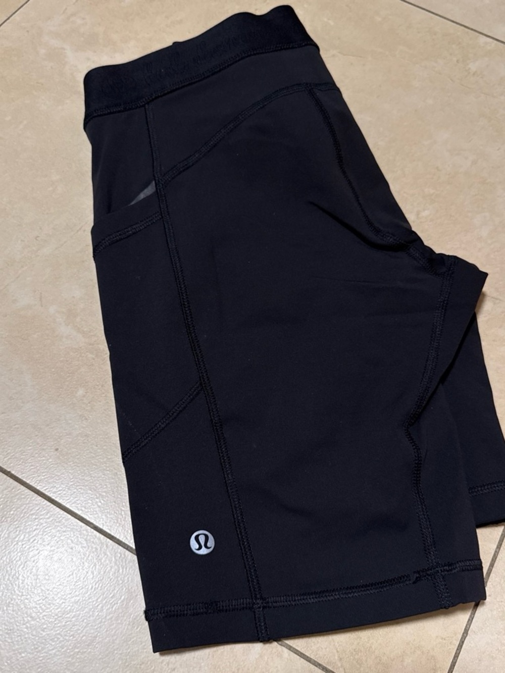 Women's LuluLemon (size 6) 8” inseam black cycling shorts with pockets -like new